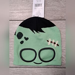 Brand New Kids Green and Black Zombie Face Beanie with Cut Out Eye Design. XS/S